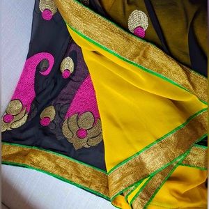 Georgette black and yellow two toned Saree.